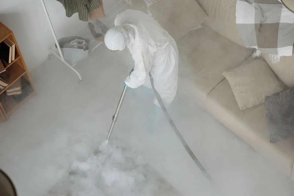 Biohazard cleanup technician in protective equipment, Chamberlayne, VA